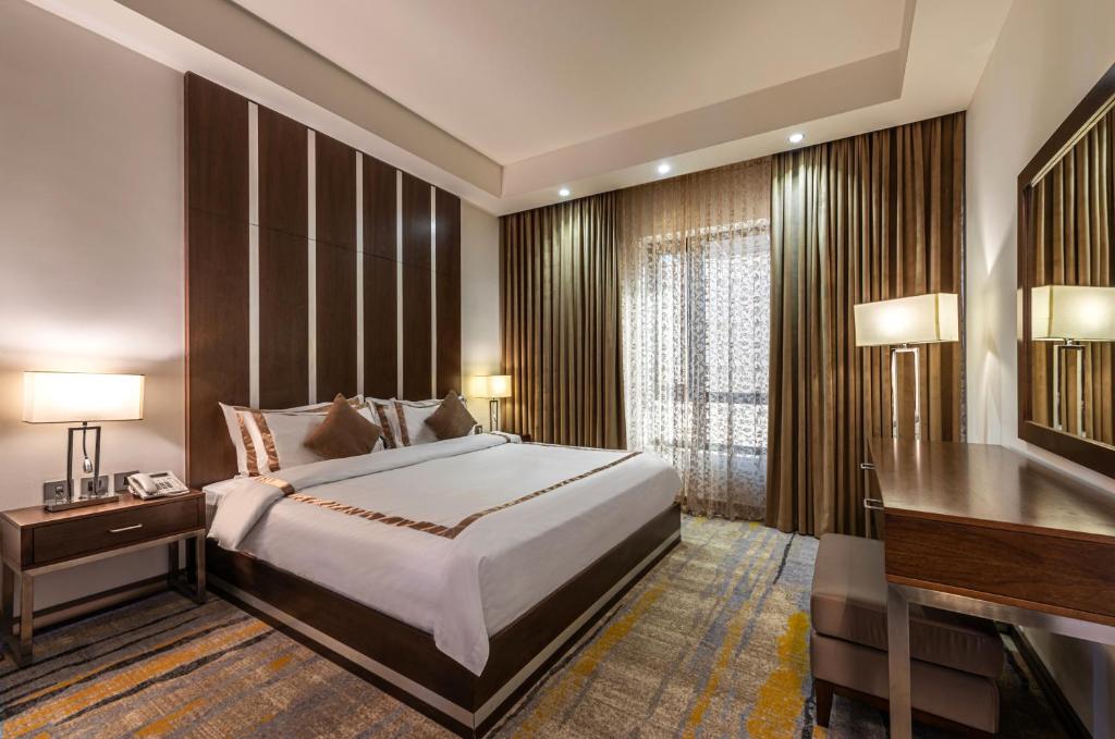 Cama o camas de una habitación en Sulaf Luxury Hotel