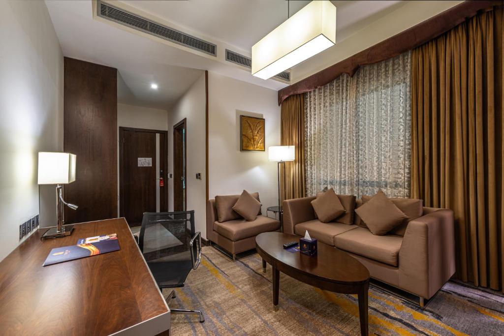 Zona de estar de Sulaf Luxury Hotel