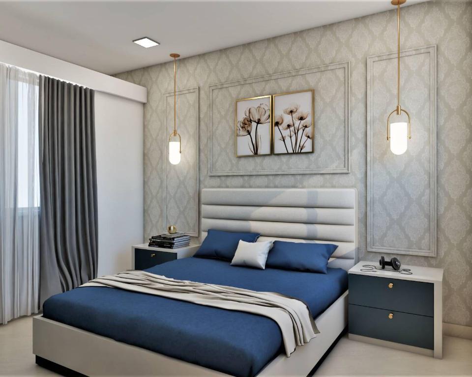 een slaapkamer met een blauw bed in een kamer bij Haven Boutique Hotel in Durban