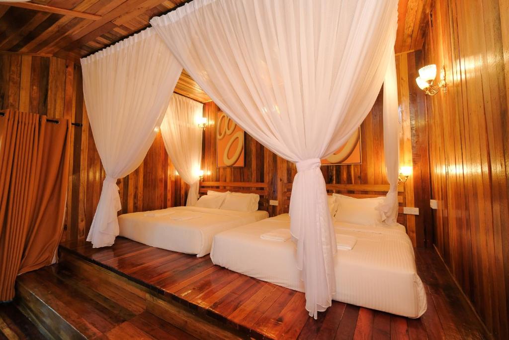 Postel nebo postele na pokoji v ubytování Woodcookies Guesthouse