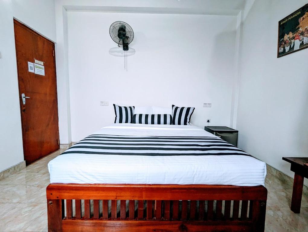 Postel nebo postele na pokoji v ubytování Brilliant View Home Stay