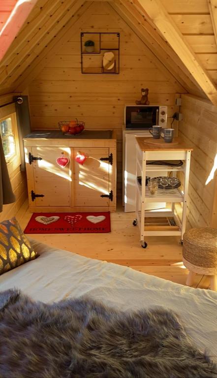 Postel nebo postele na pokoji v ubytování Camping Paradis le Moulin des Oies