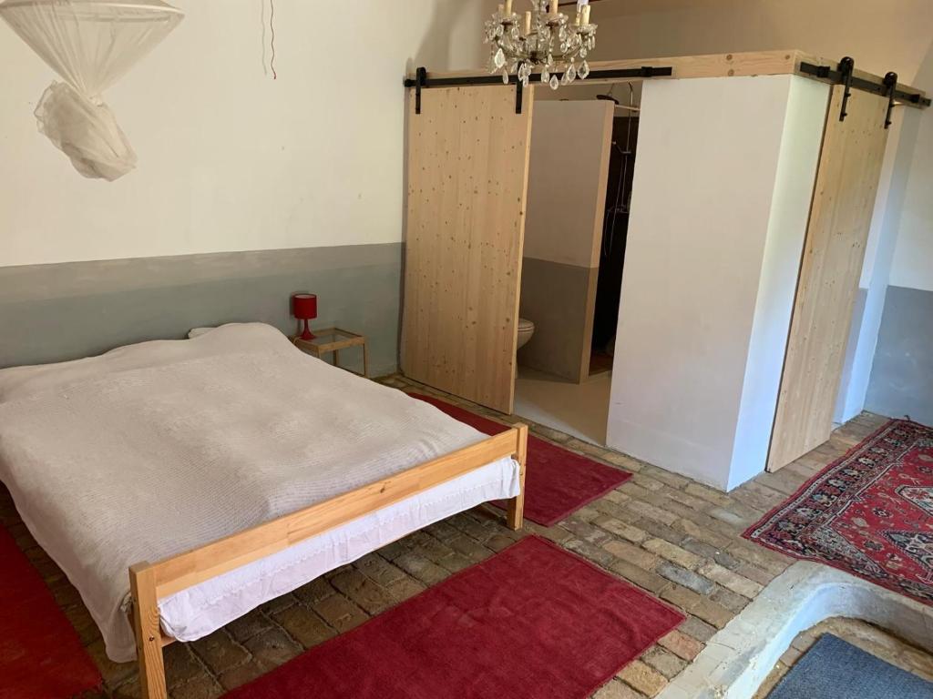 Postel nebo postele na pokoji v ubytování Feked Farmstay