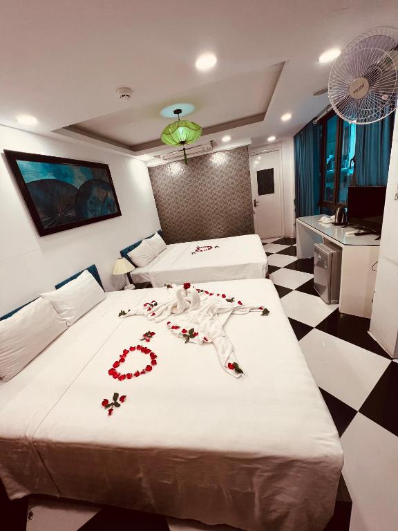 Postel nebo postele na pokoji v ubytování Hanoi Prime Garden Hotel & Spa