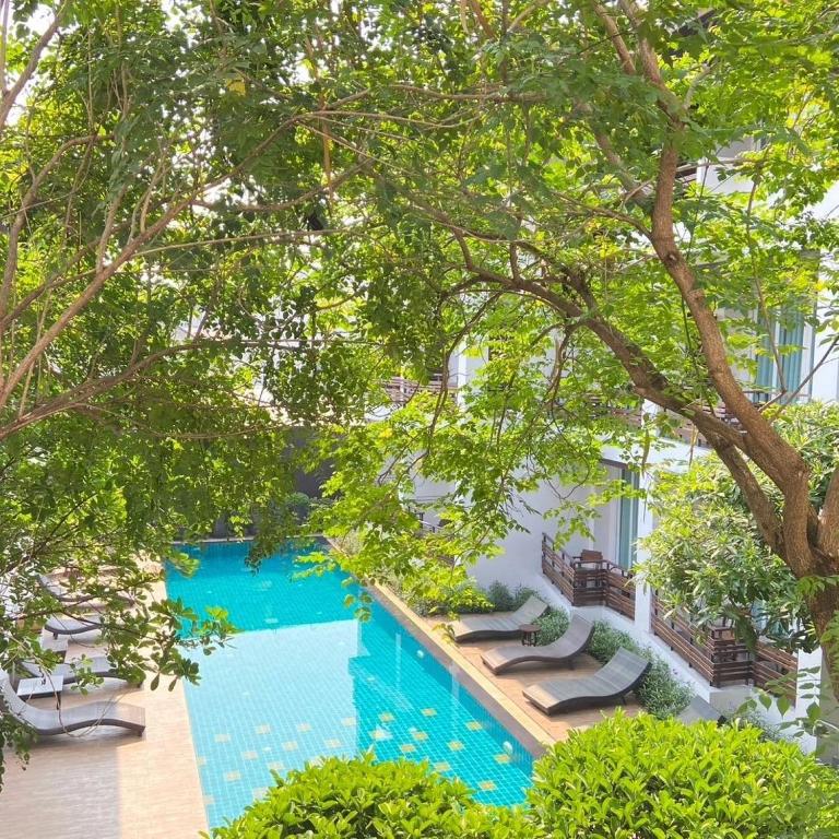Bazén v ubytování Le Patta Resort & Hotel Chiang Rai nebo v jeho okolí