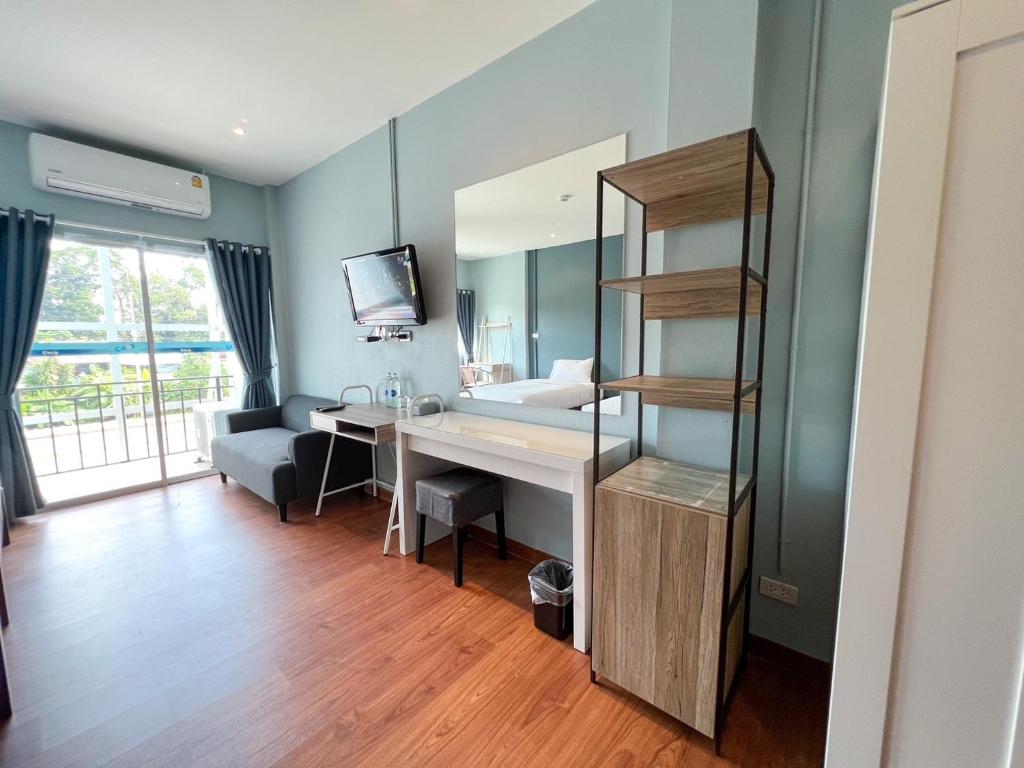 Postel nebo postele na pokoji v ubytování A Hotel Cozy