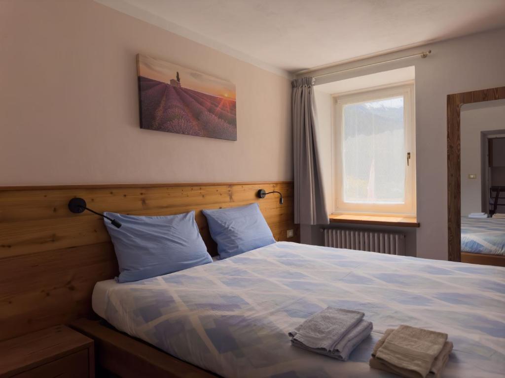 Postel nebo postele na pokoji v ubytování Appartamenti LITEGOSA casa vacanza 1