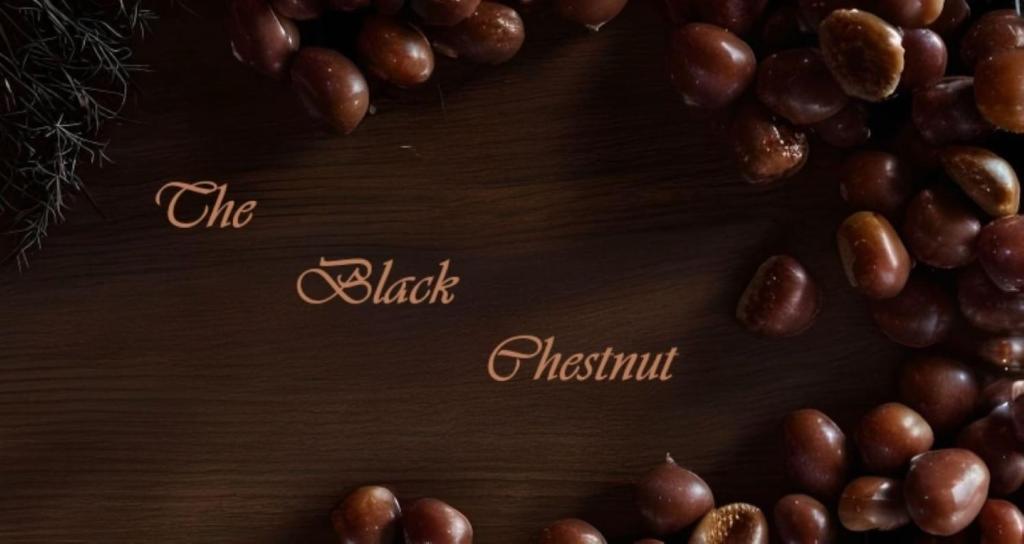 a frame of chestnuts on a wooden table at The Black Chestnut in Áyios Nikólaos