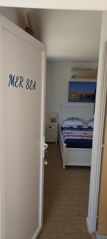 Letto o letti in una camera di Chambres d'hôtes Un Eté Sans Fin à 50 m de la plage à Canet plage