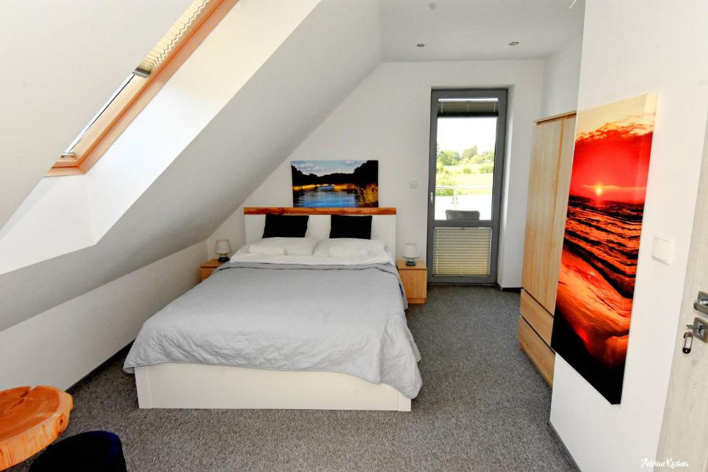 Кровать или кровати в номере Polanki 17 Apartment