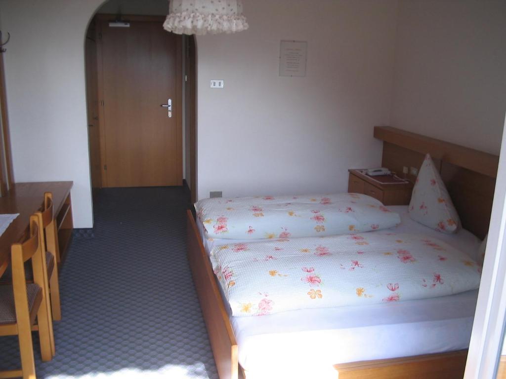 Postel nebo postele na pokoji v ubytování Hotel Elisabeth