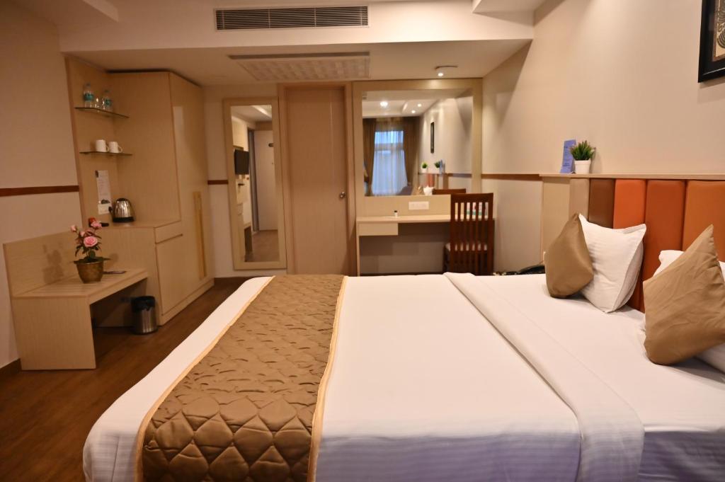 Postel nebo postele na pokoji v ubytování Soho Boutique Hotel