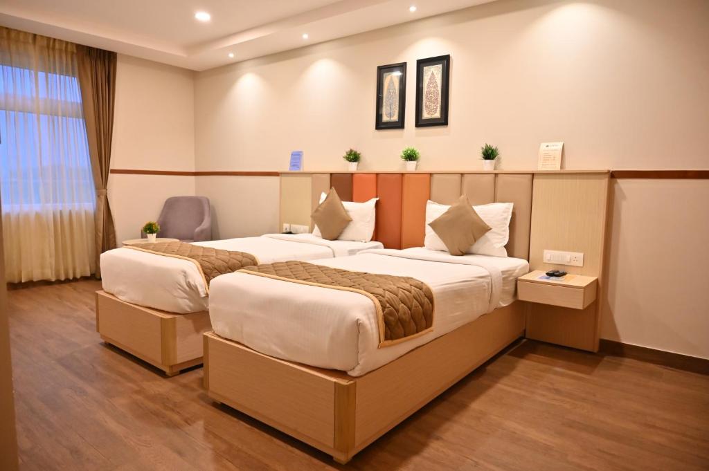 Postel nebo postele na pokoji v ubytování Soho Boutique Hotel
