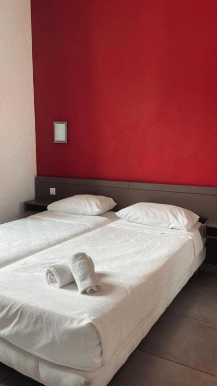 Postel nebo postele na pokoji v ubytování Hotel Riviera