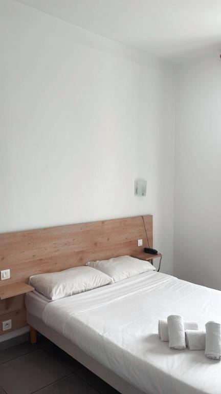 Postel nebo postele na pokoji v ubytování Hotel Riviera