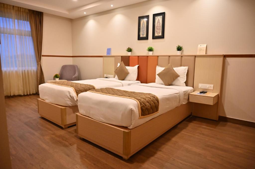 Postel nebo postele na pokoji v ubytování Soho Boutique Hotel