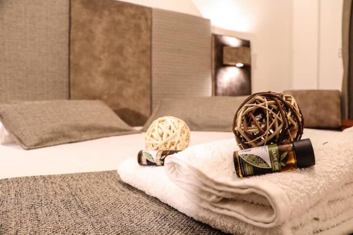 Postel nebo postele na pokoji v ubytování Hotel Dionysis Studios