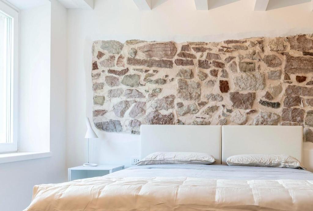 Posteľ alebo postele v izbe v ubytovaní Dimora Bonapace