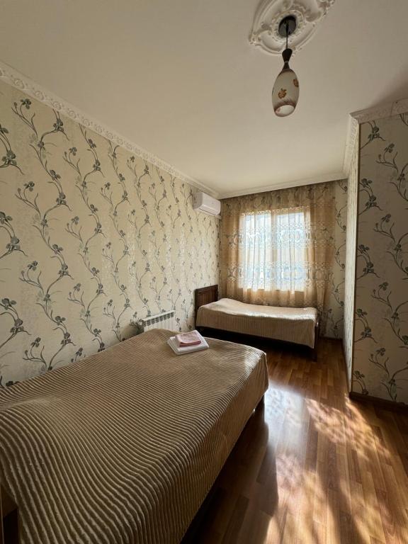 Postel nebo postele na pokoji v ubytování Hotel Oniks