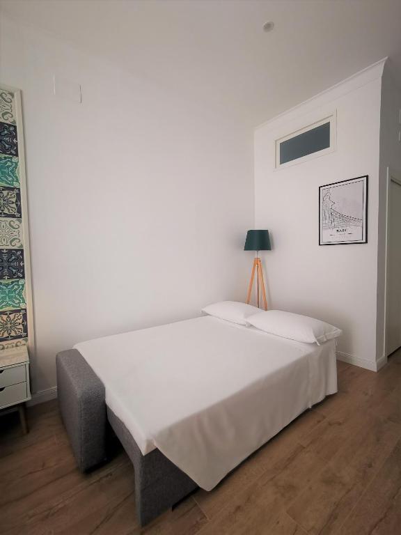 Postel nebo postele na pokoji v ubytování Cattaro 65 - Flexible Check-in apartments