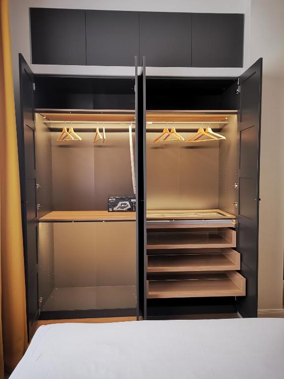 Palanda nebo palandy na pokoji v ubytování Cattaro 65 - Flexible Check-in apartments