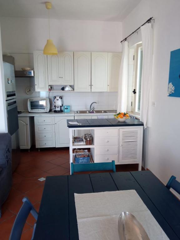 Kuchyň nebo kuchyňský kout v ubytování Ambrosio home