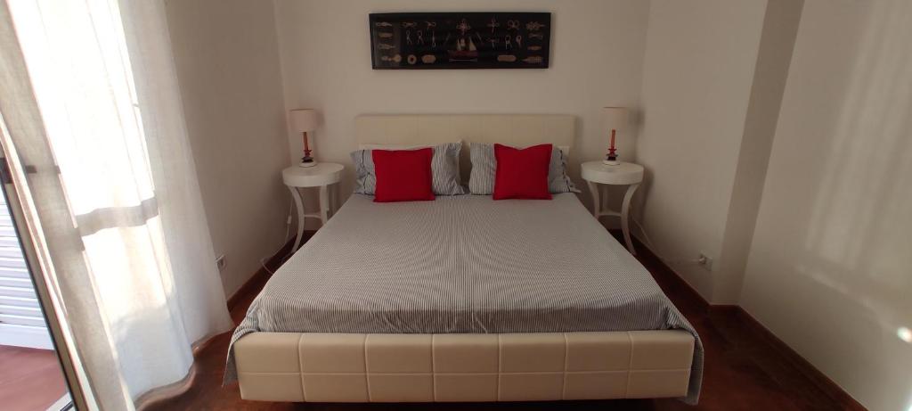 Postel nebo postele na pokoji v ubytování Ambrosio home