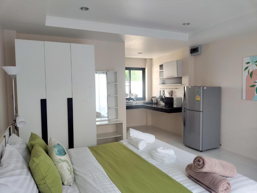Kuchyň nebo kuchyňský kout v ubytování Villa LunaSole Samui