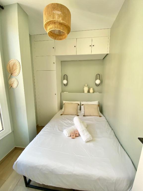 Postel nebo postele na pokoji v ubytování Appartement moderne climatisé Monaco vue Mer