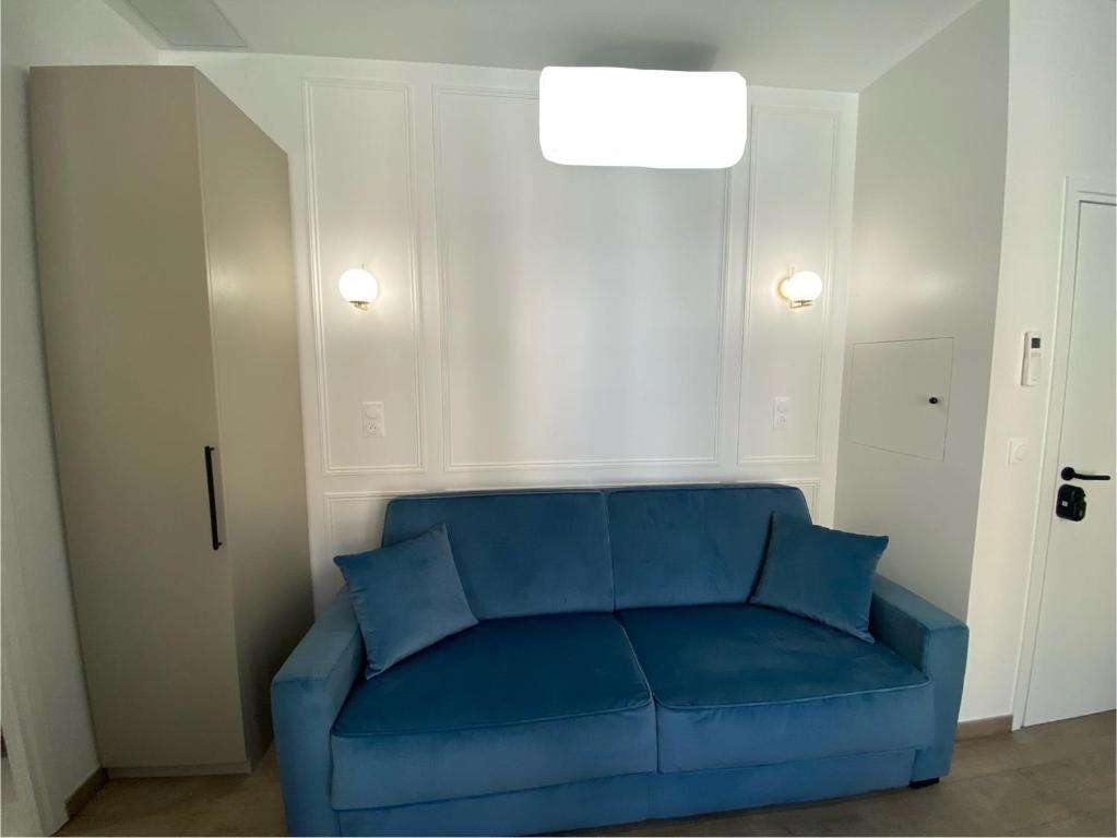 Posezení v ubytování Appartement moderne climatisé Monaco vue Mer