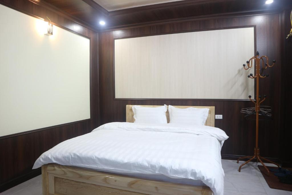 Postel nebo postele na pokoji v ubytování Mây Núi Homestay