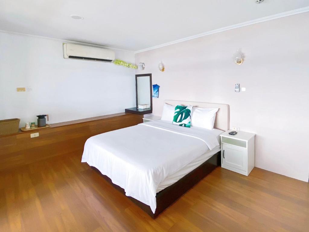 Postelja oz. postelje v sobi nastanitve 南鴻雅築South Home