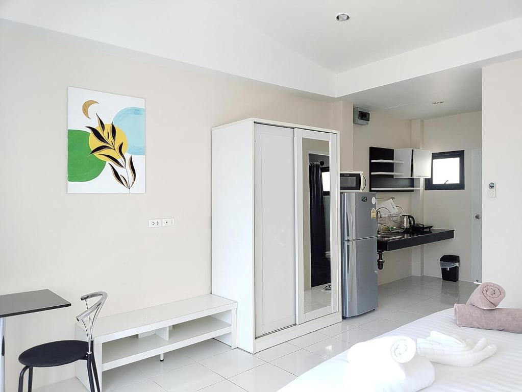 Kuchyň nebo kuchyňský kout v ubytování Villa LunaSole Samui