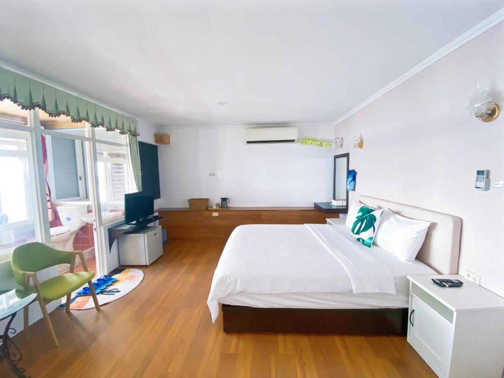 Postelja oz. postelje v sobi nastanitve 南鴻雅築South Home