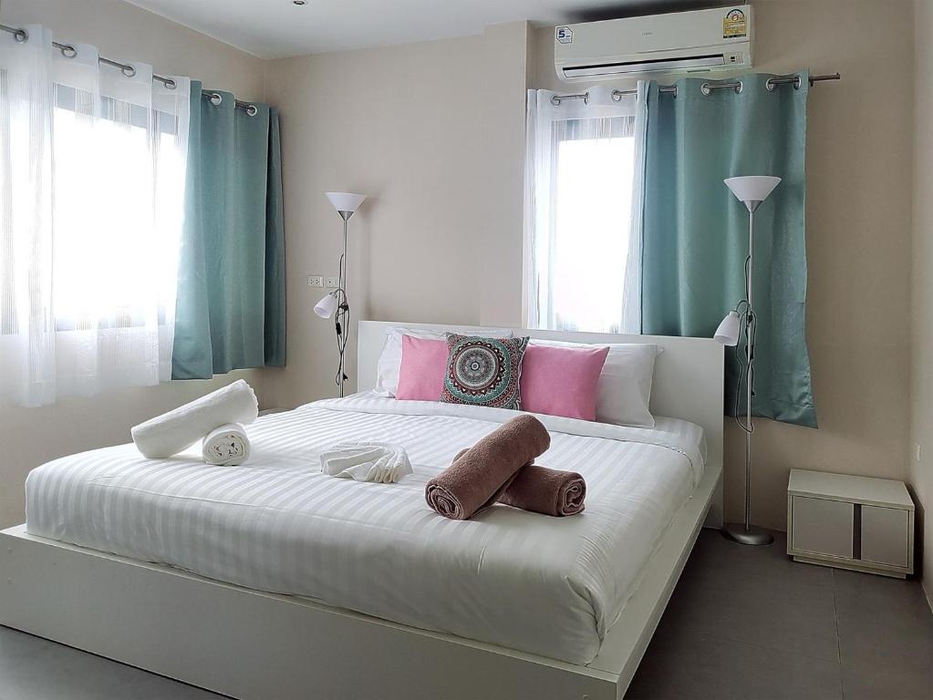 Postel nebo postele na pokoji v ubytování Villa LunaSole Samui