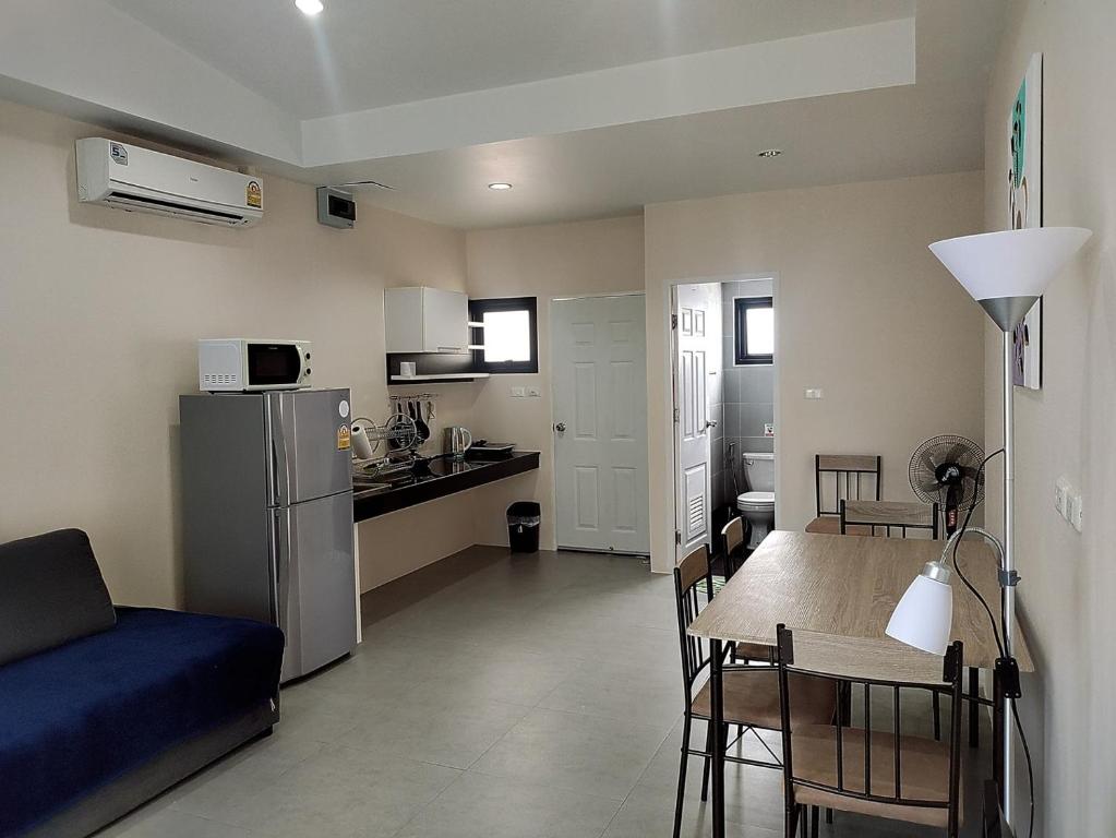 Kuchyň nebo kuchyňský kout v ubytování Villa LunaSole Samui