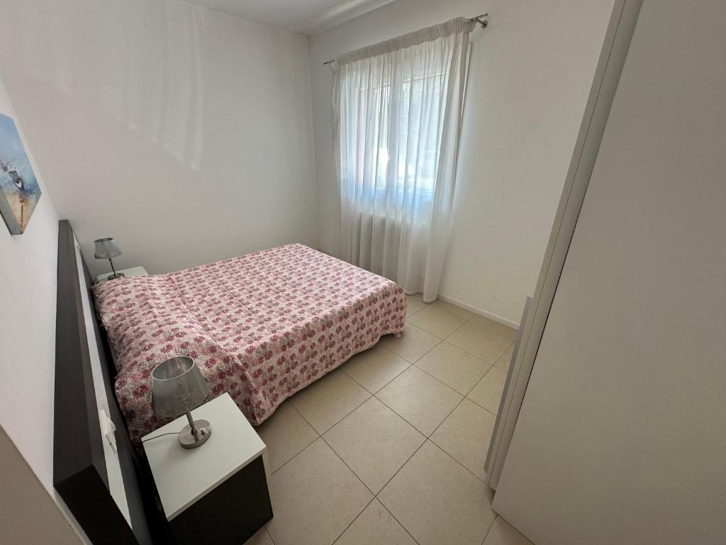 Posteľ alebo postele v izbe v ubytovaní Residence Orate - Agenzia Cocal