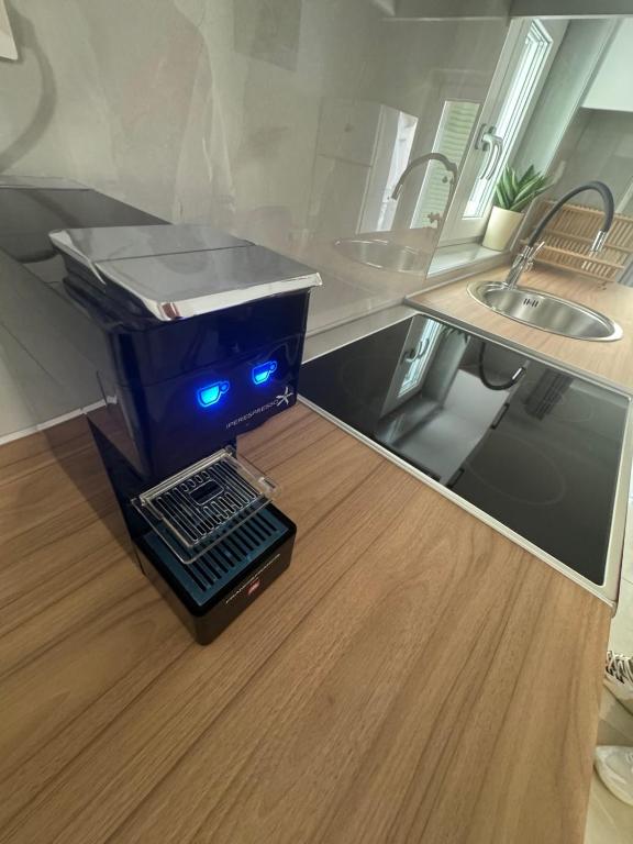 Kuchyň nebo kuchyňský kout v ubytování Moretti Studios