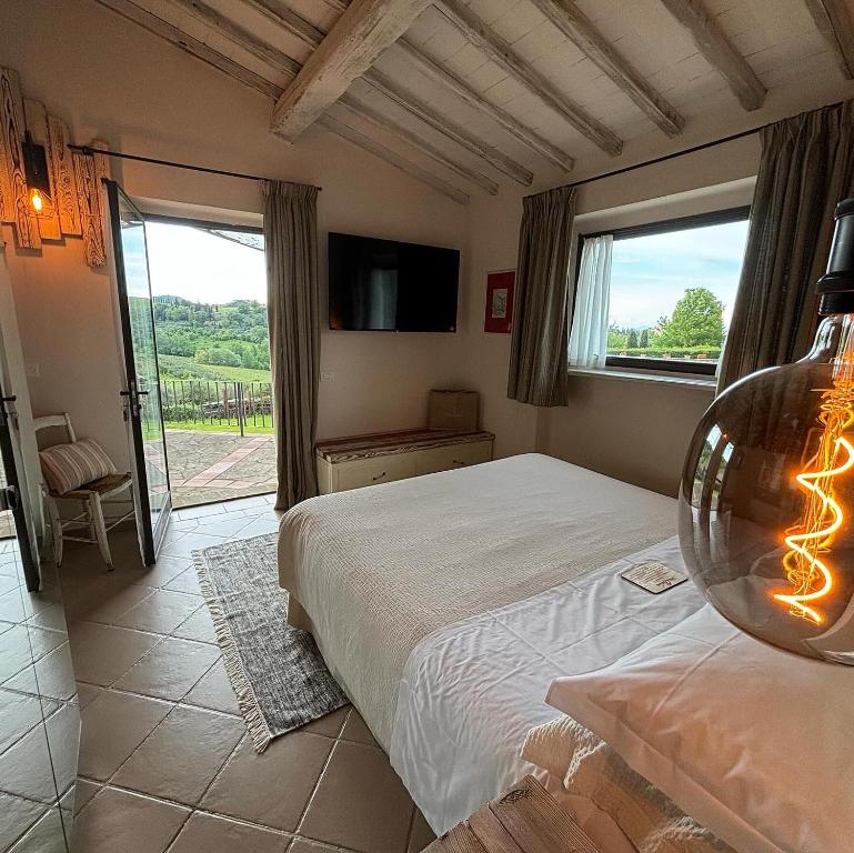 Postel nebo postele na pokoji v ubytování Podere Bellavista
