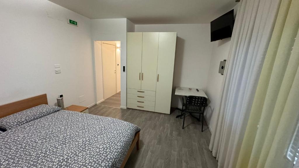 Postel nebo postele na pokoji v ubytování B&B DIVINO