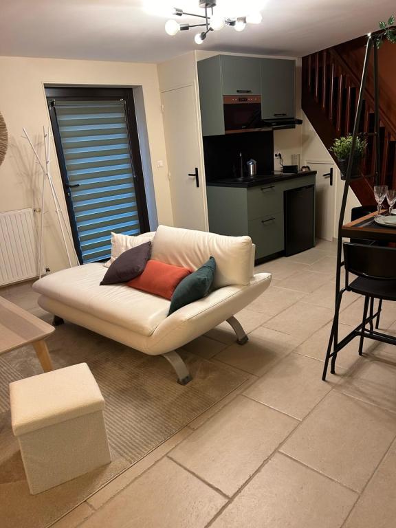Kuchyň nebo kuchyňský kout v ubytování Logement cosy et moderne