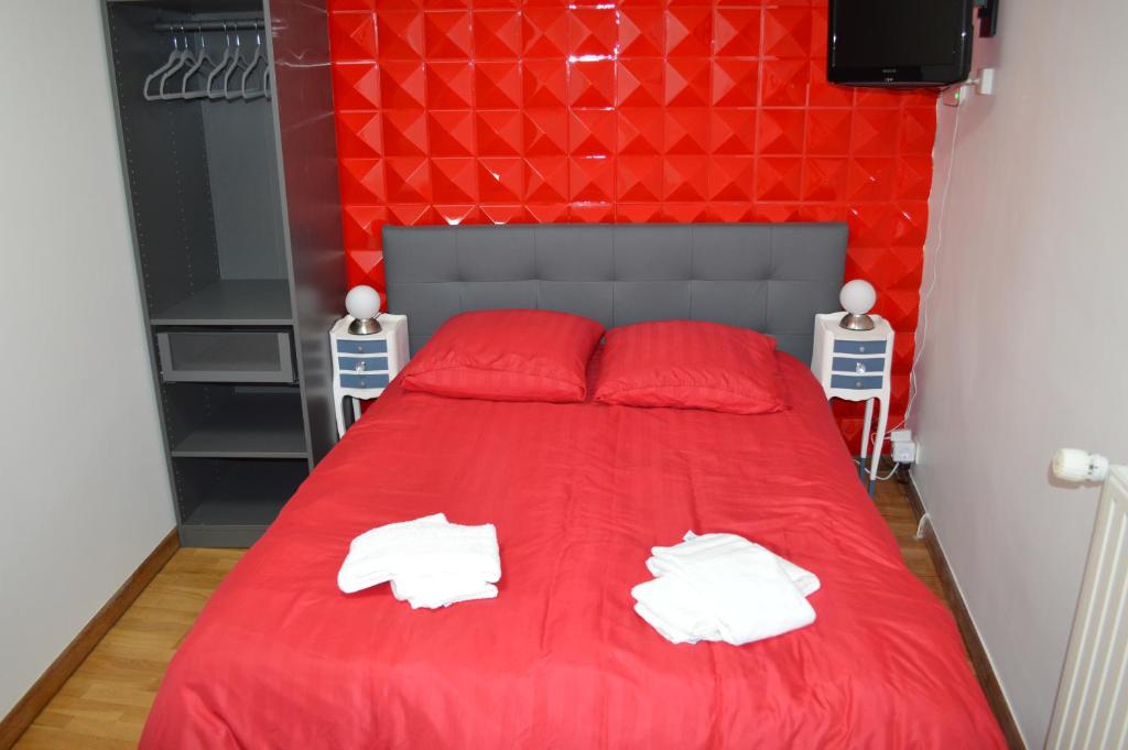 Postel nebo postele na pokoji v ubytování Logement cosy et moderne