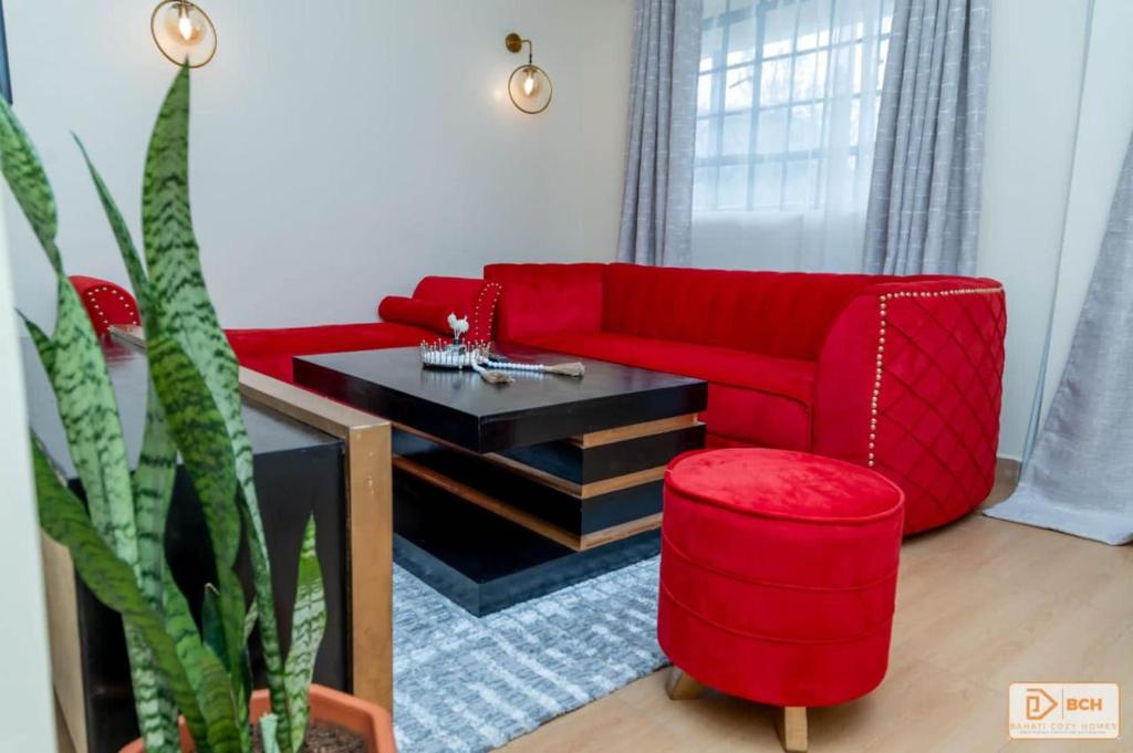 Posezení v ubytování Bahati Cozy Homes