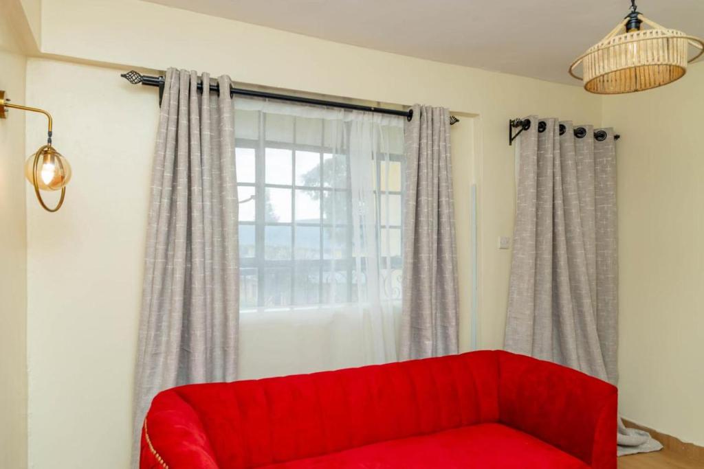 Posezení v ubytování Bahati Cozy Homes