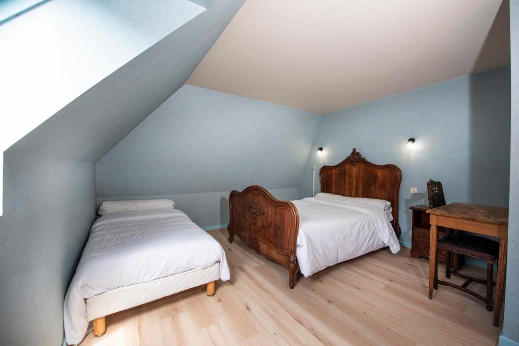 Postel nebo postele na pokoji v ubytování Hotel 1610