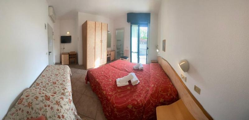 Postel nebo postele na pokoji v ubytování Hotel Silvaion