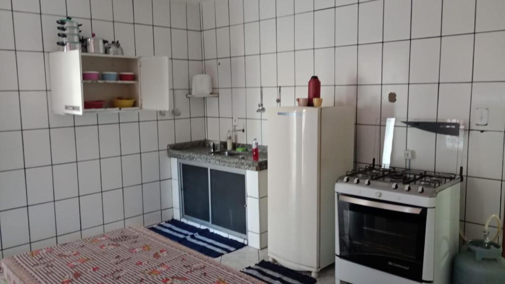 Nhà bếp/bếp nhỏ tại Casa a 300 metros do Santuário