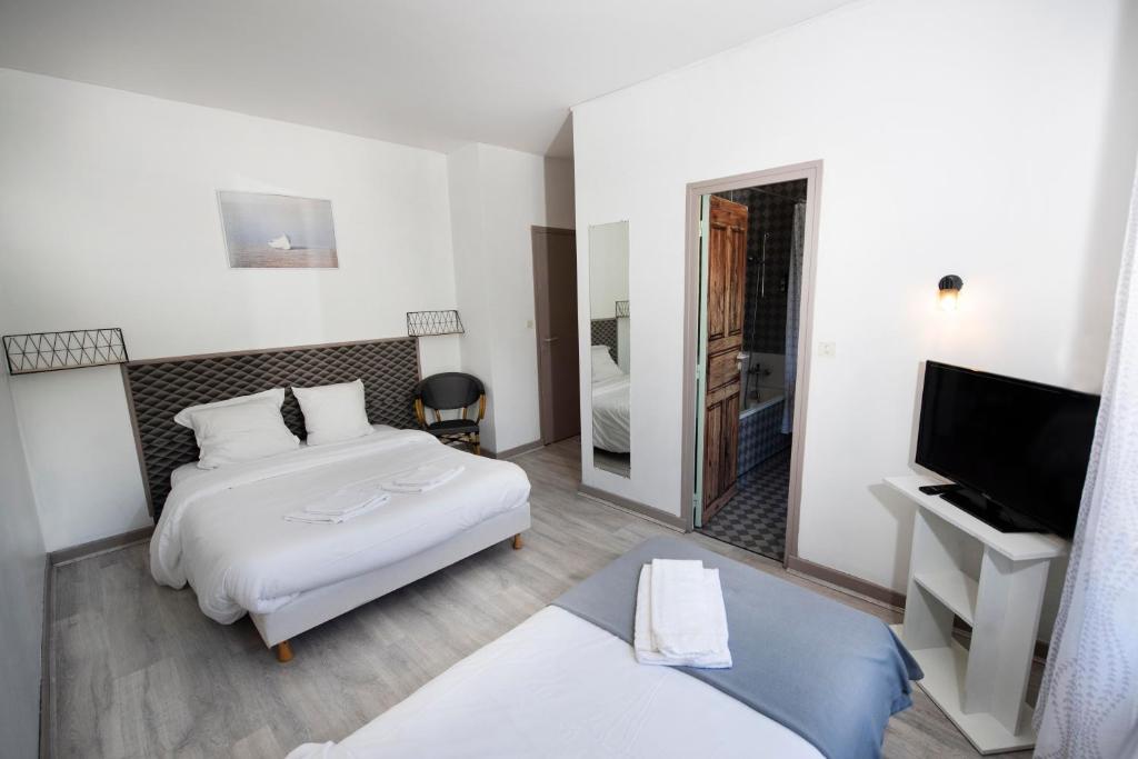 Postel nebo postele na pokoji v ubytování Hotel 1610