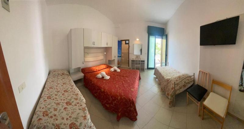 Postel nebo postele na pokoji v ubytování Hotel Silvaion