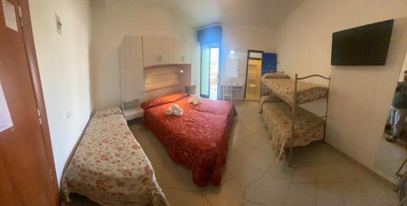 Postel nebo postele na pokoji v ubytování Hotel Silvaion